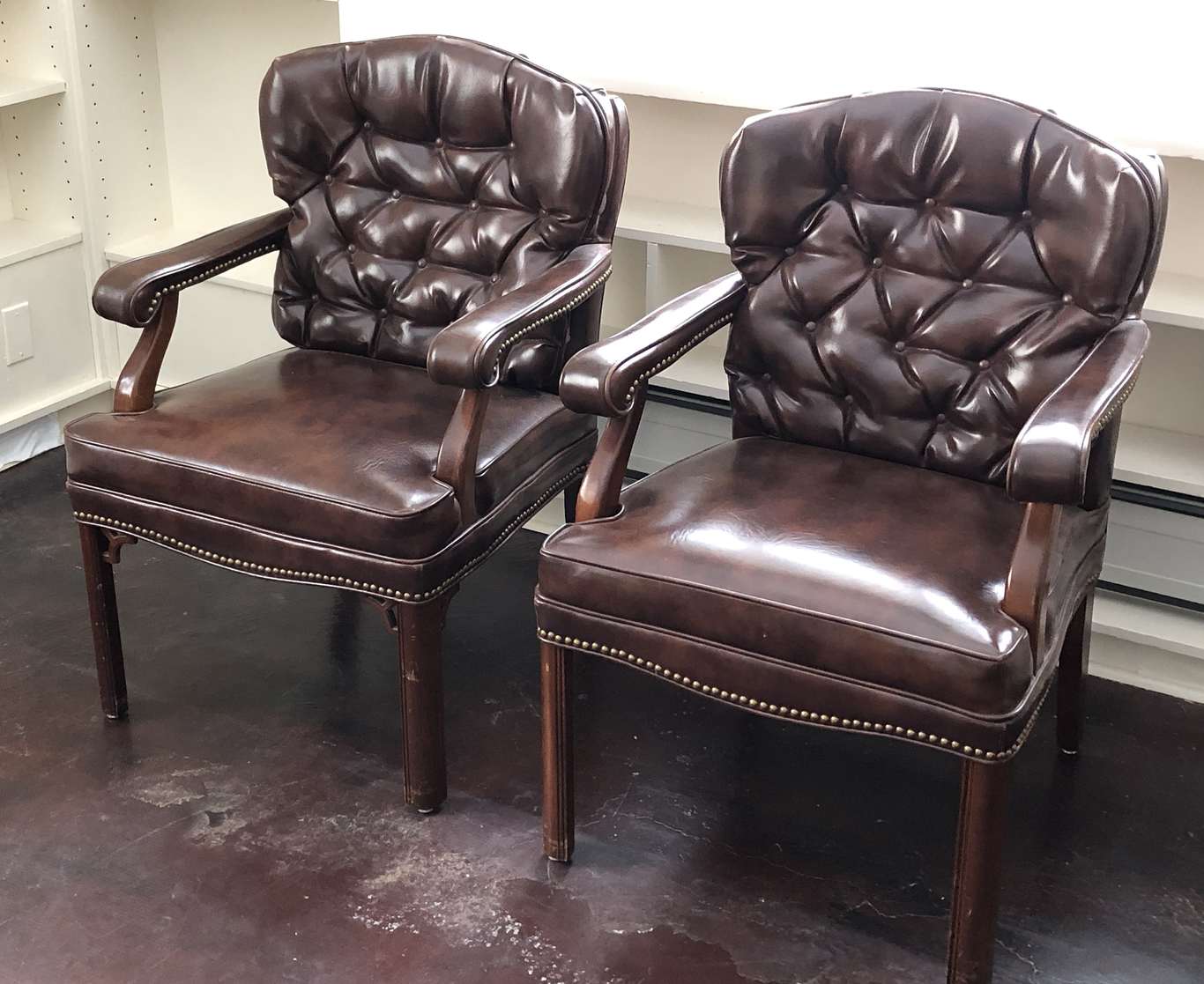 Pair of brown leather office chairs (6-8)